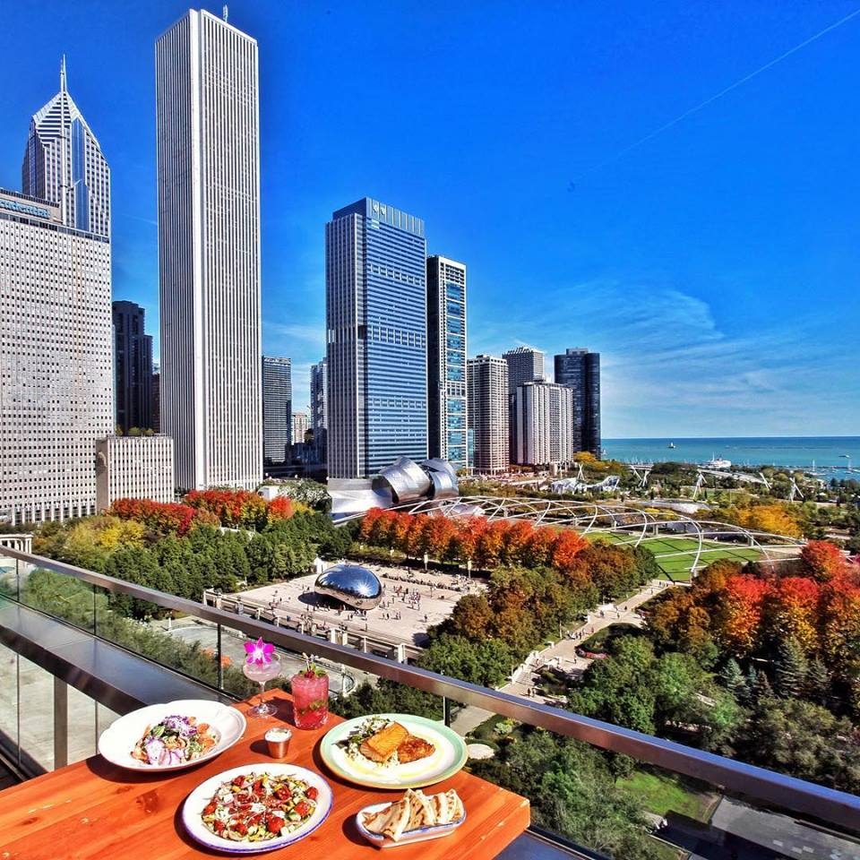Brunch on the terrace at Cindy's, with the Bean and the skyline beyond.