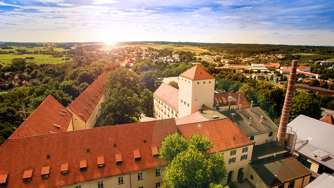 Aerial view of the Weihenstephan brewery complex on the hill in Freising at sunrise, the world's oldest brewery.