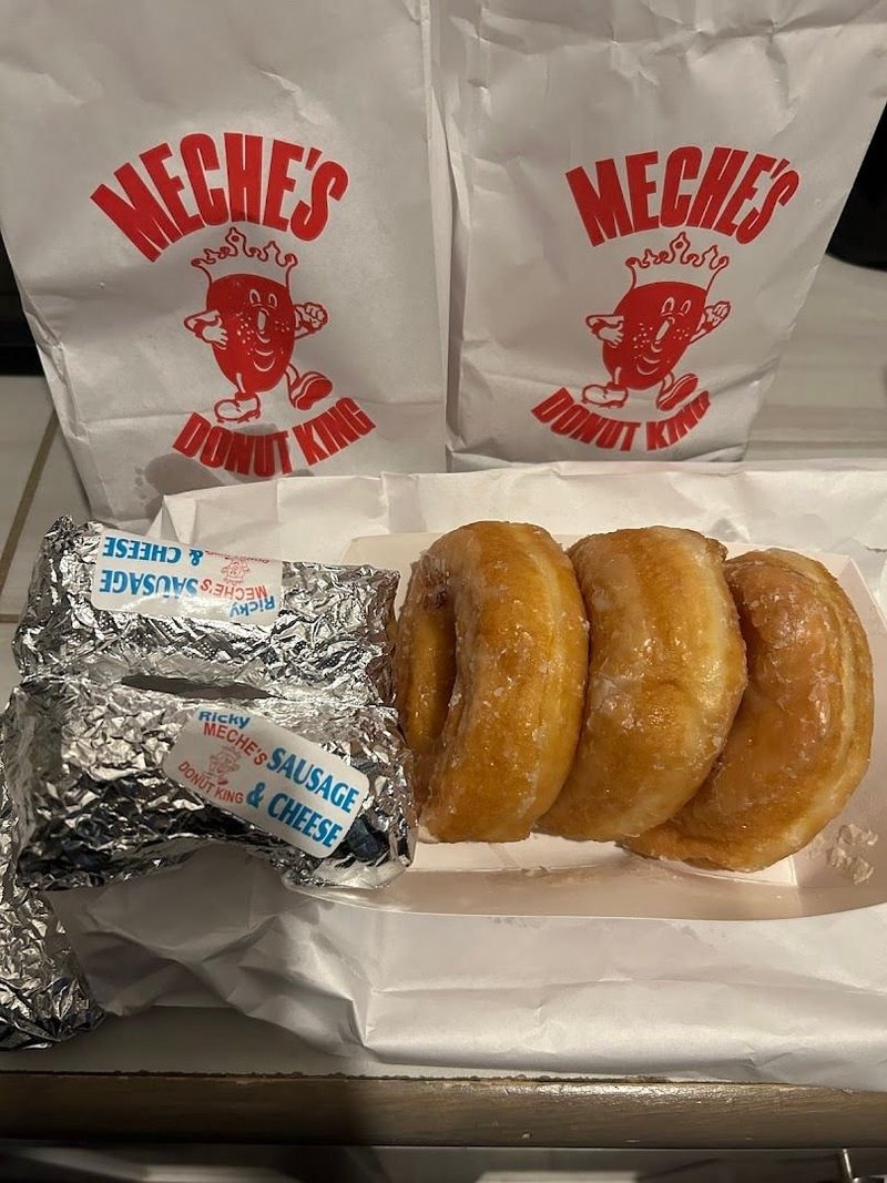 Glazed donuts and sausage and cheese kolaches at Rickey Meche's Donut King
