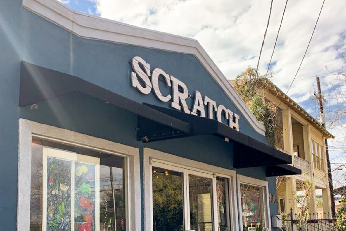 The Scratch Farm Kitchen storefront with hand-painted murals
