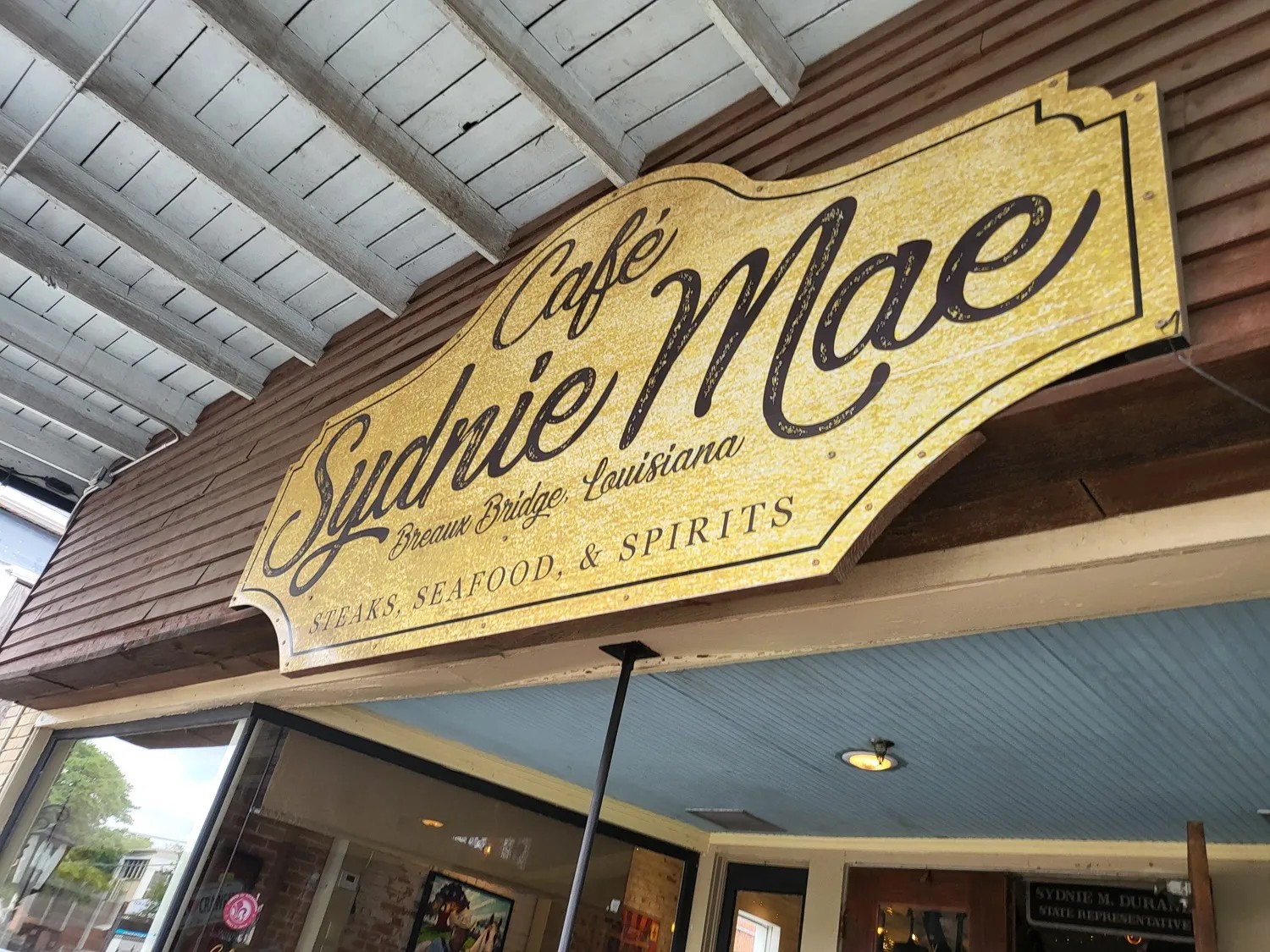 The Cafe Sydnie Mae storefront on Bridge Street in Breaux Bridge