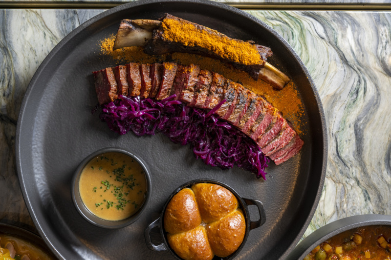 Short rib pastrami suya with coco bread at Tatiana