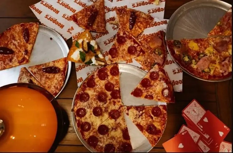 Keepers' bar pies on branded trays