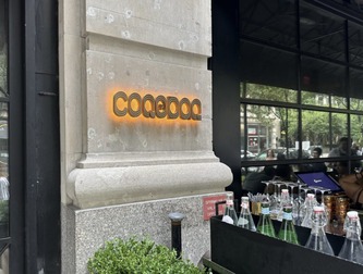 COQODAQ entrance signage on East 22nd Street