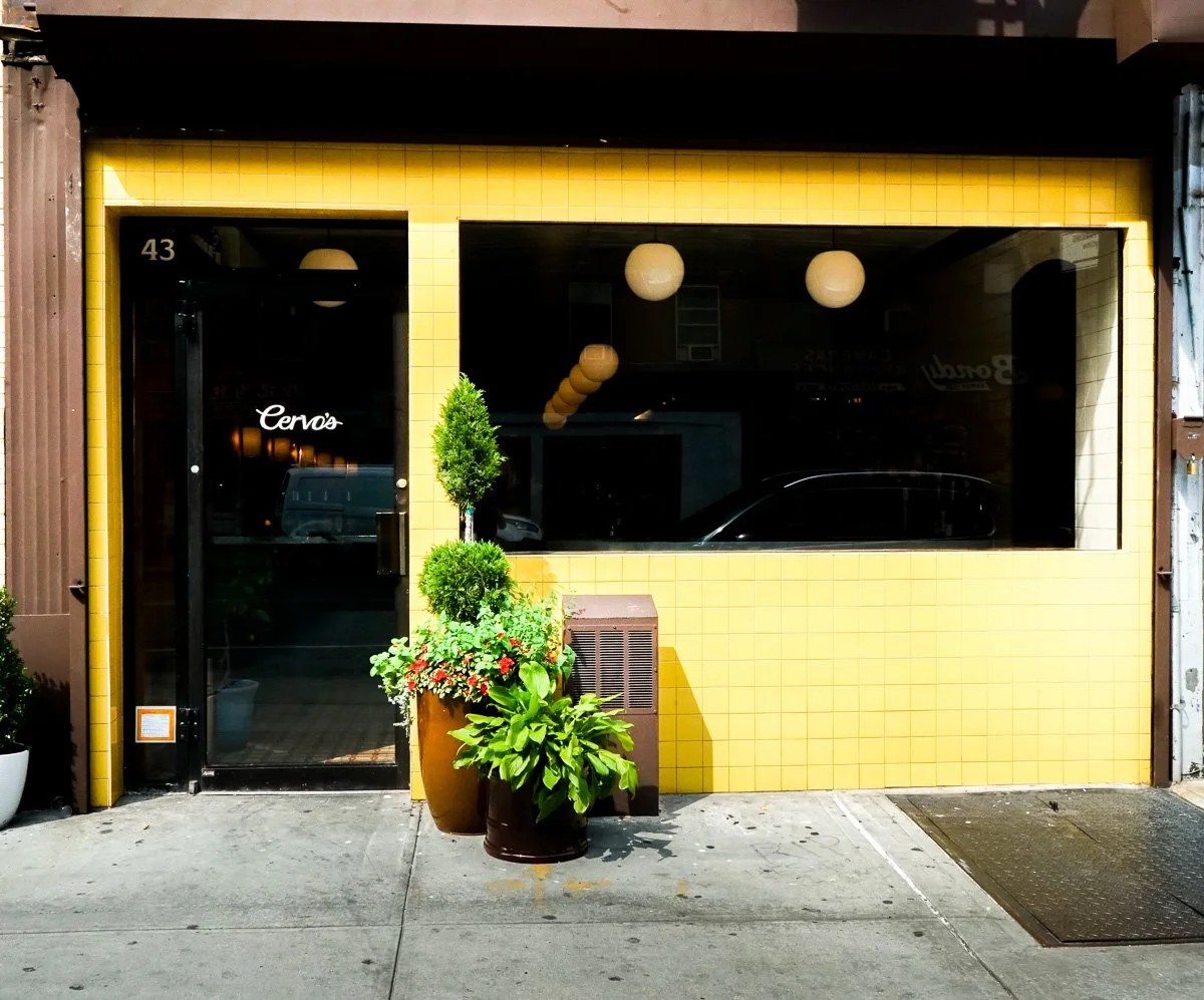 The yellow-tiled Cervo's storefront at 43 Canal Street