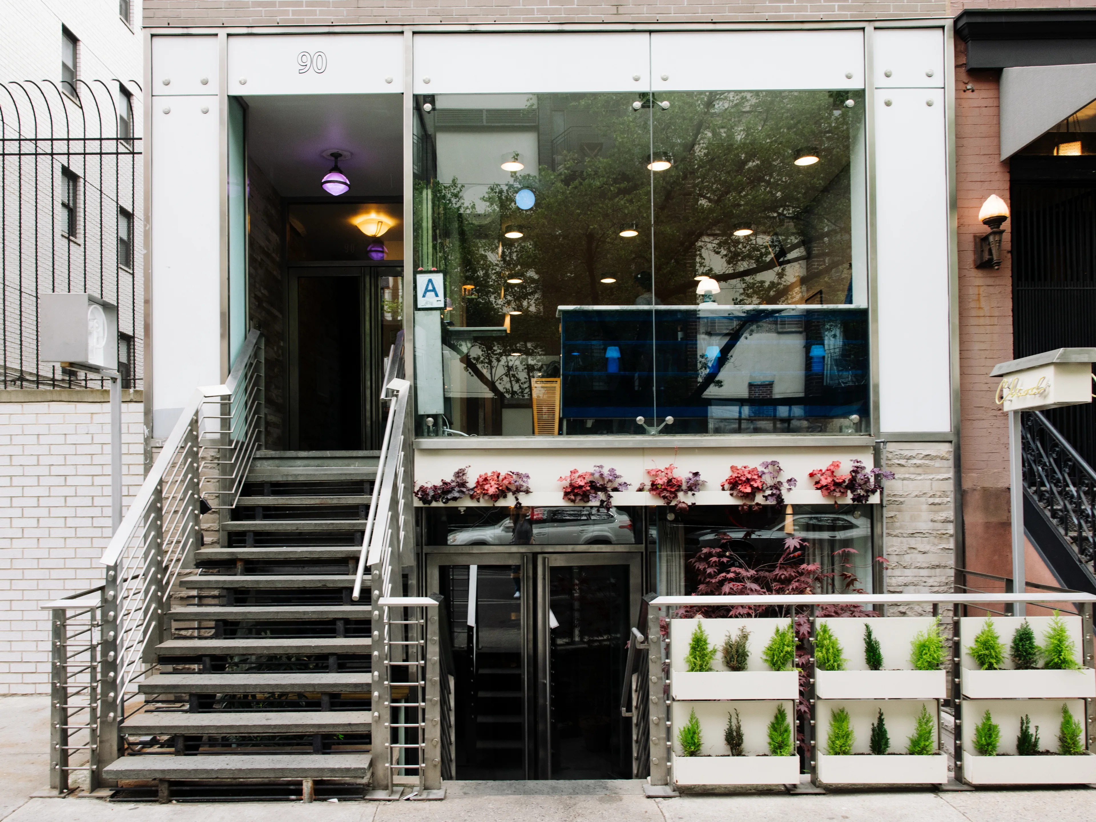 The entrance to Penny at 90 E 10th St, above Claud