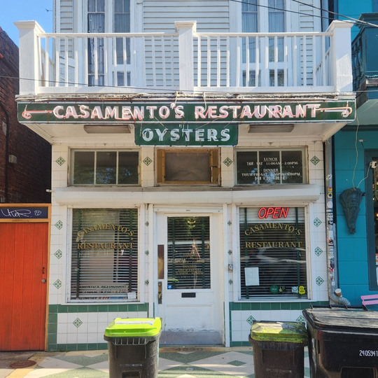 The tile-clad facade of Casamento's Restaurant on Magazine Street in New Orleans, with its vintage OYSTERS signage.