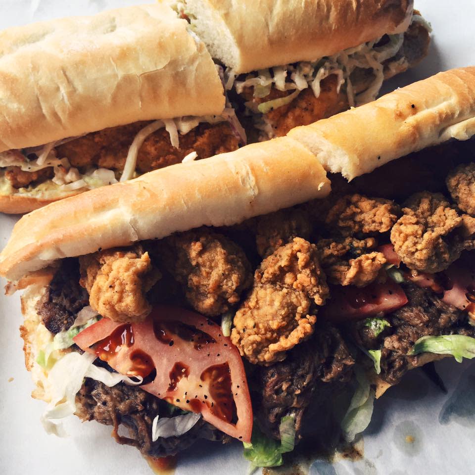 The Surf & Turf po'boy at Pop's Poboys: debris roast beef and a crispy Gulf oyster under horseradish peppercorn sauce.