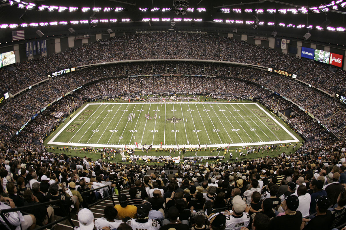 Game night at the Caesars Superdome in New Orleans — the stadium glowing before a Monday night Saints kickoff.