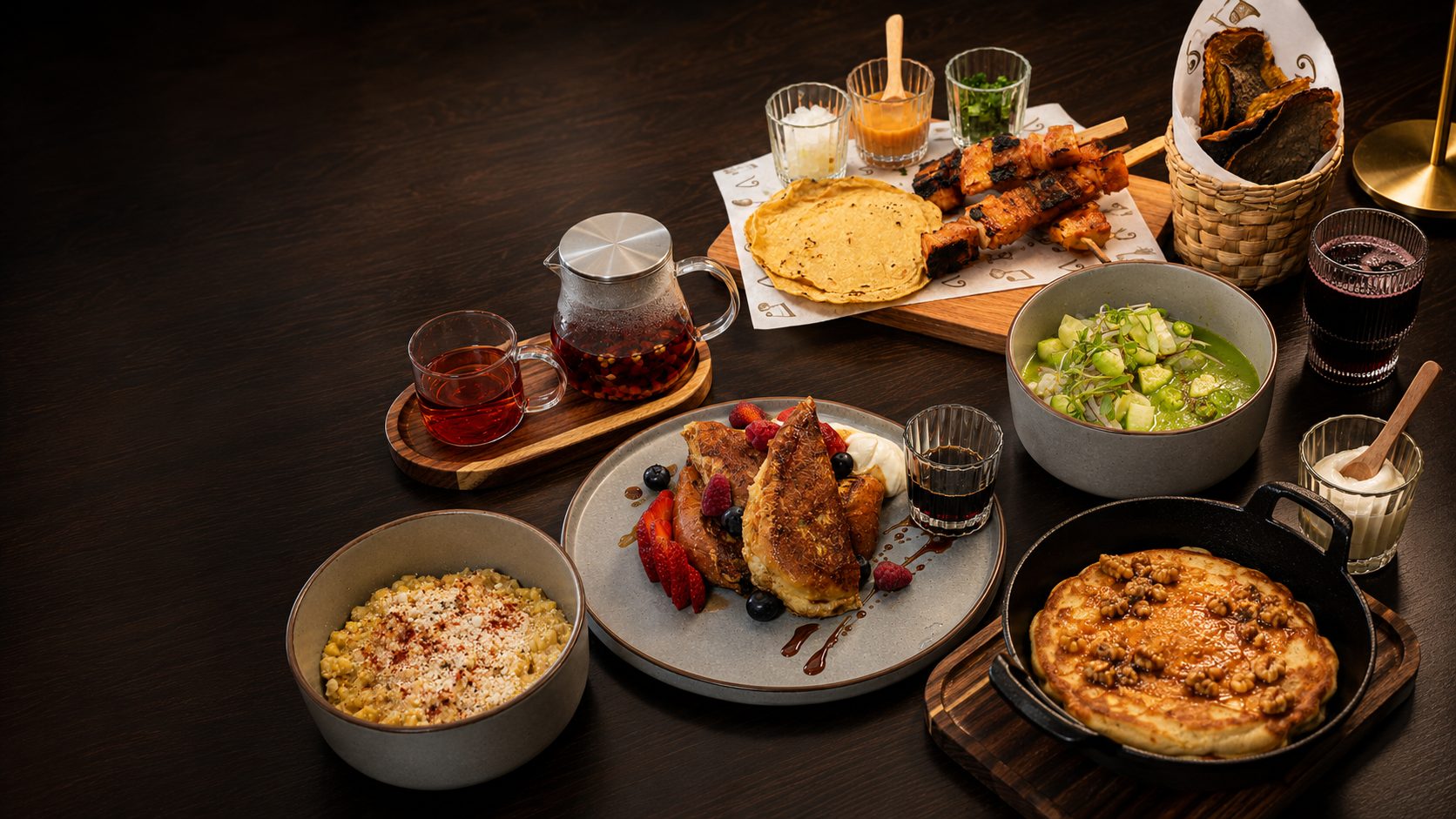 The breakfast spread at Versos Mexican Cocina in downtown Santa Fe, with French toast, corn cups, grilled skewers, and tortillas