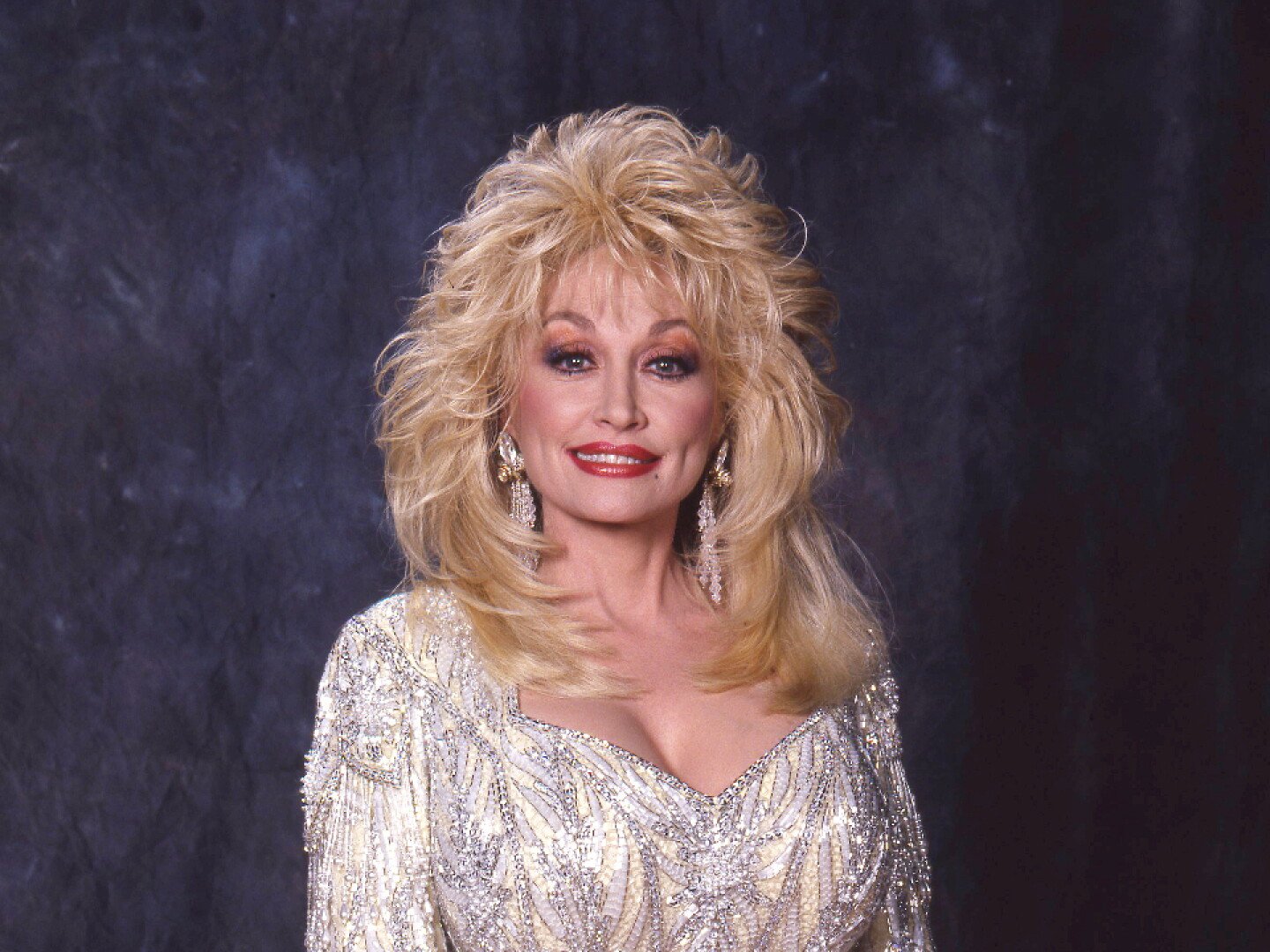 Dolly Parton in full glamour. Her SongTeller Hotel opened September 29 in downtown Nashville.